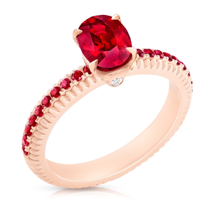 Fabergé Ruby Rose Gold Fluted Ring features an oval Mozambican ruby centre stone, with pavé-set rubies, set in 18 karat fluted rose gold. 