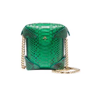 Manu Atelier introduce a micro bag expertly made by hand from green python and fitted with gleaming gold hardware.