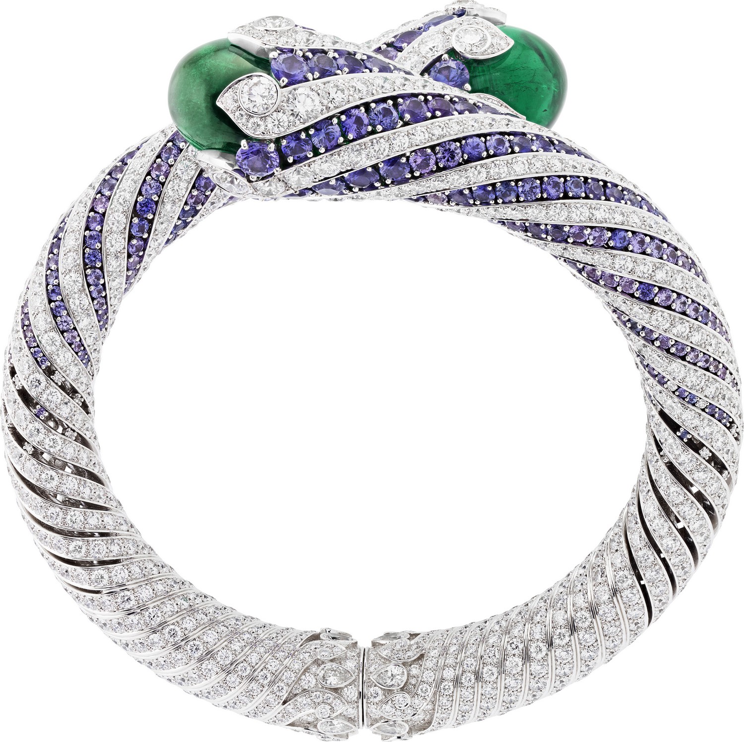White gold, round diamonds, round mauve sapphires, 2 cabochon-cut emeralds of 19.80 and 21.48 carats (Colombia).