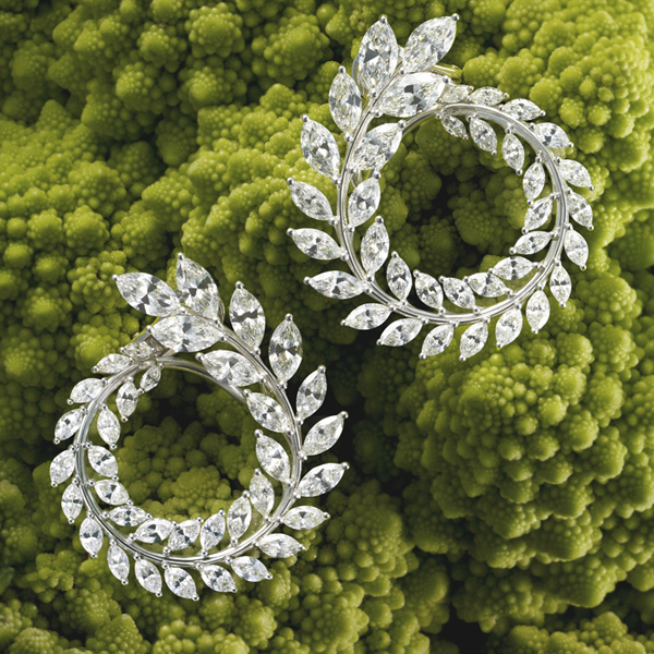 Earrings featuring marquise-cut white diamonds set in a laurel design, crafted in 18-carat Fairmined white gold.