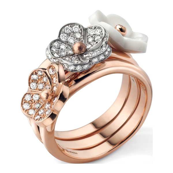Kombi ring with three diamond pavé flowers and pink gold