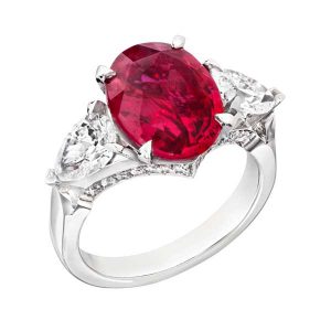 Fabergé, Devotion ring features an oval Mozambican ruby centre stone of 4.53 carats and white diamonds, set in platinum