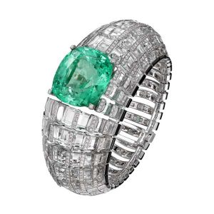 Cartier  Étourdissant Clarté Bracelet set with a majestic 66.09ct cushion-shaped Colombian emerald, rock crystal, onyx and diamonds.