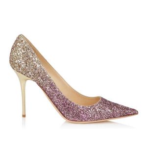 A beautiful Jimmy Choo leather pump finished with a boho pink and gold coarse glitter dégradé upper. Made in Italy. 