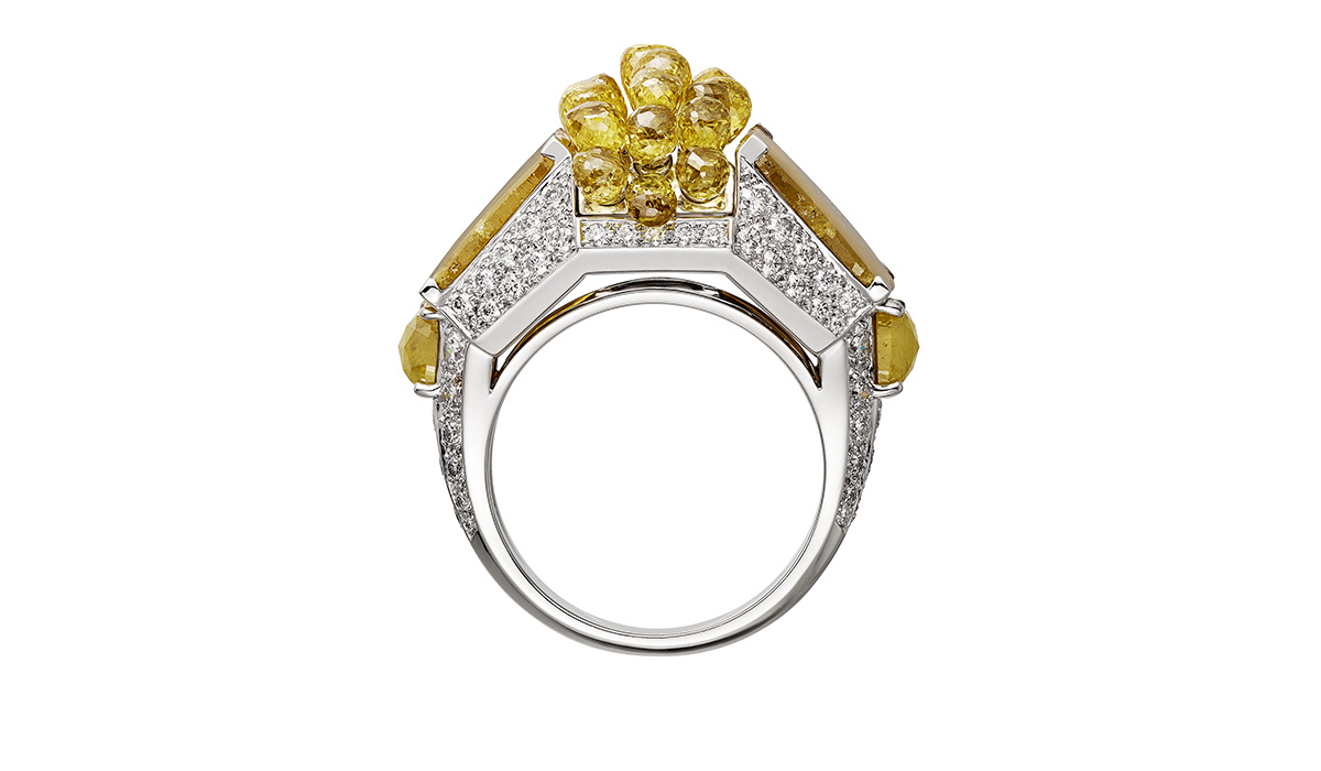 Platinum Yuma ring with yellow and white diamonds.