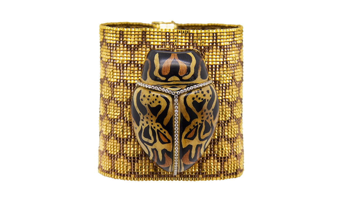 Scarab beaded bracelet set in gold with diamonds and wood marquetry