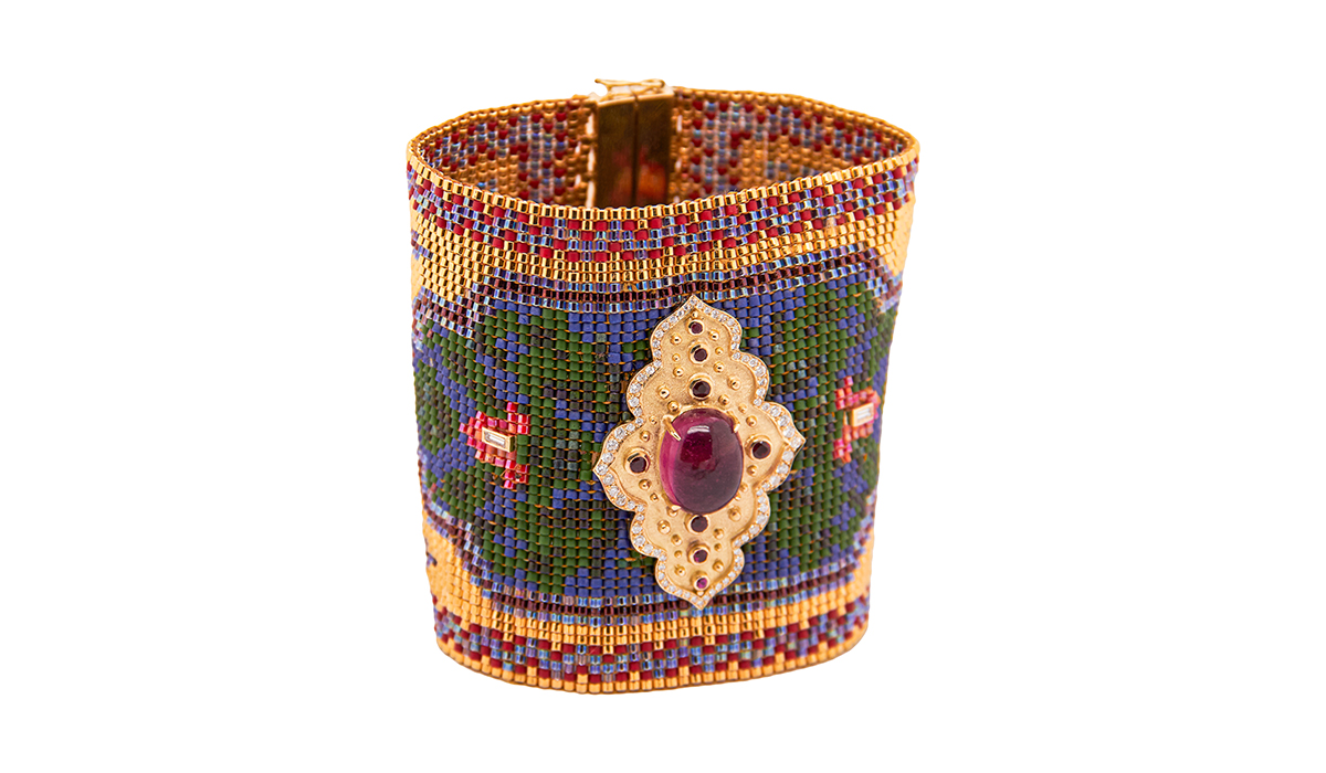 Bracelet in 18k gold, a pink tourmaline, diamonds, rubies and 49 rows of colorful beads with gold background, Silvia Furmanovich