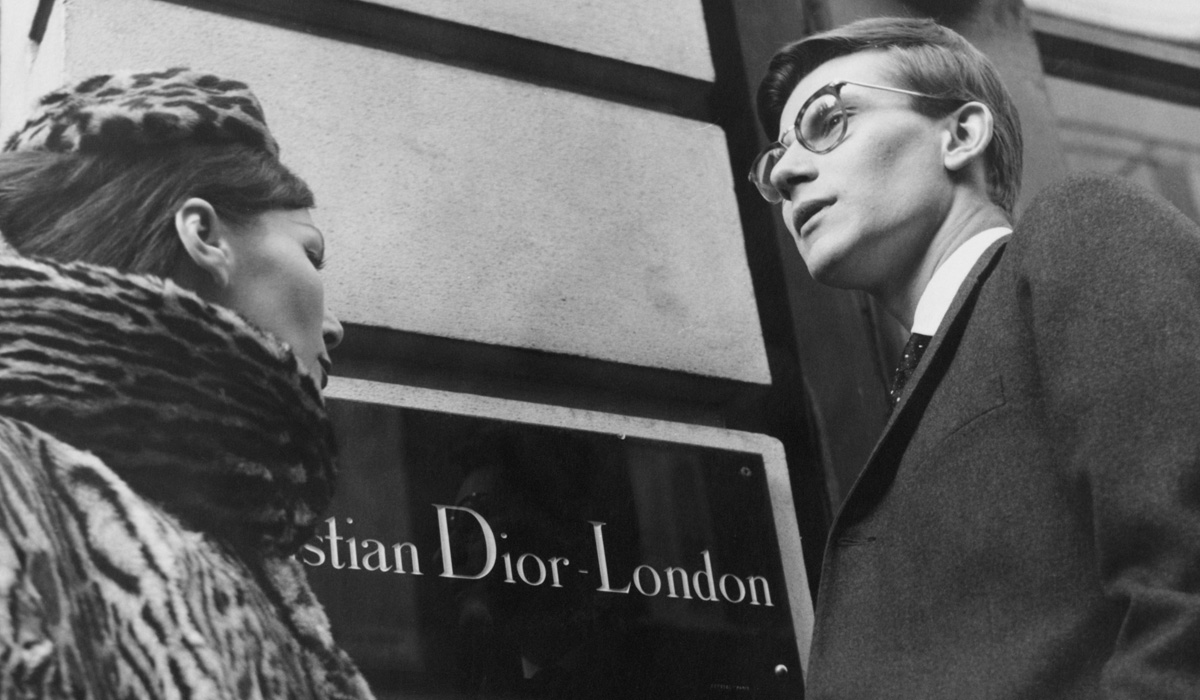  Yves Saint Laurent in front of Christian Dior London, 11th November 1958 © Popperfoto/Getty Images