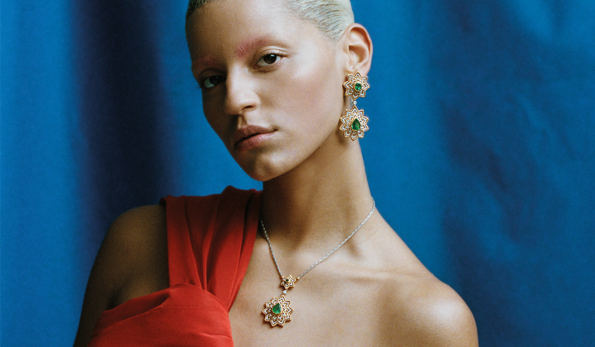 pendant necklace and earrings with diamonds and emeralds by Buccellati. Dress, Albino Teodoro