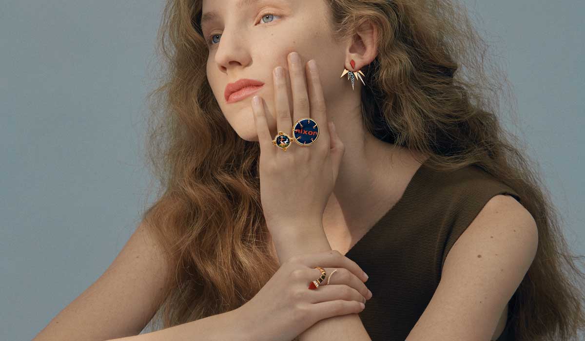 Left hand rings, Francesca Villa. Earrings and right hand ring, Anapsara. Jumpsuit, Cividini