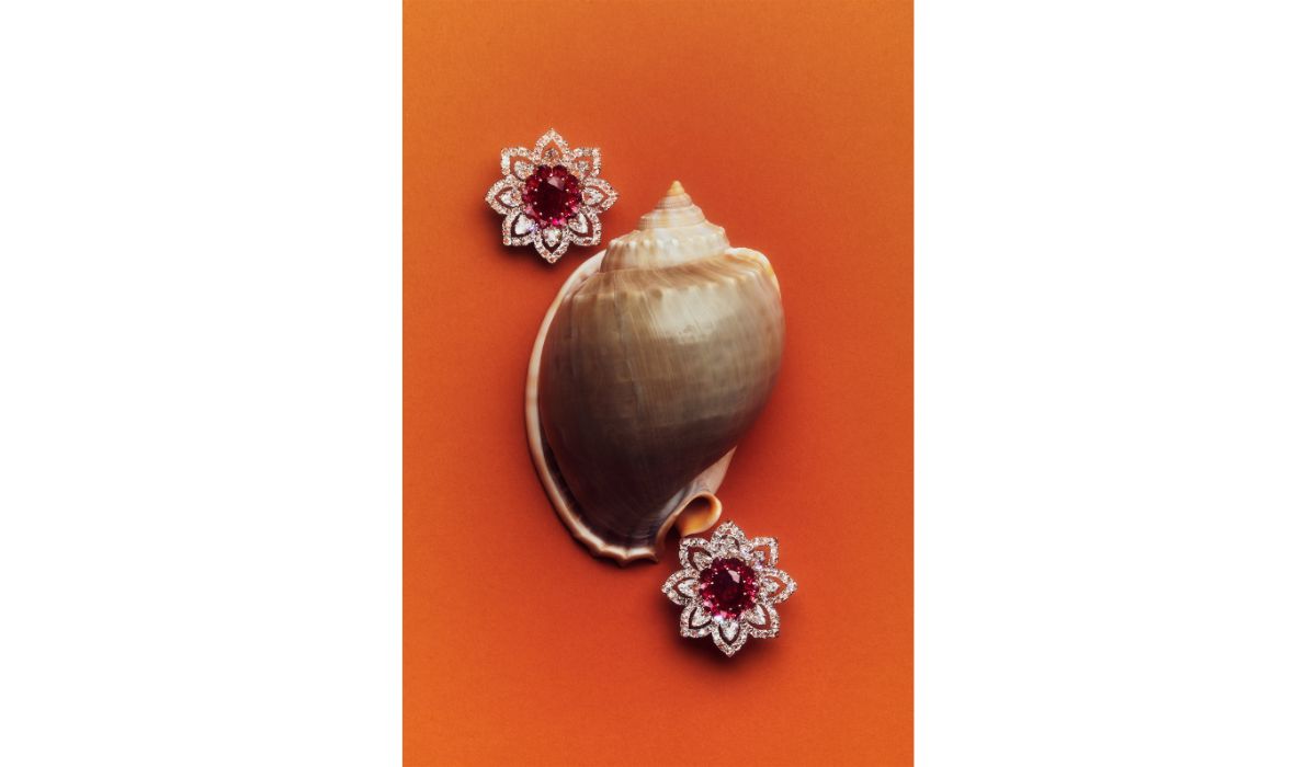 White gold and diamond Eden earrings, set with two central oval-cut Burmese rubies and pear-cut rubies, Busatti Milano