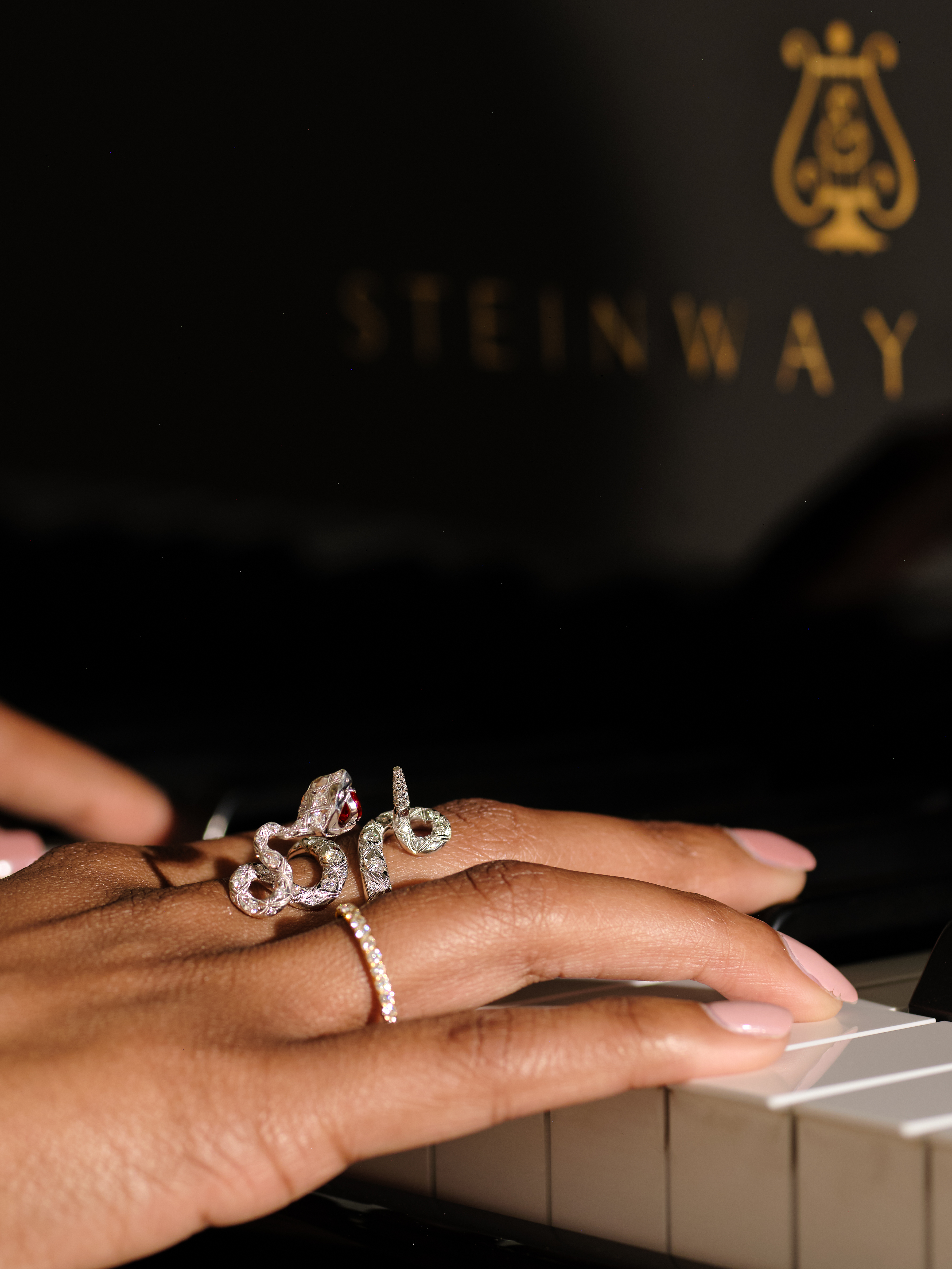 Folium with Serpentis Statement Ring at the Piano. V1