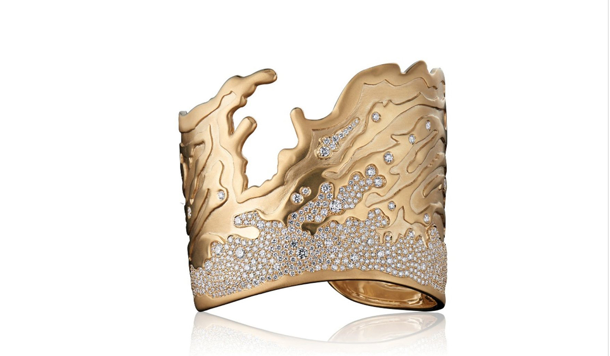 Gold bangle with diamonds by Hueb