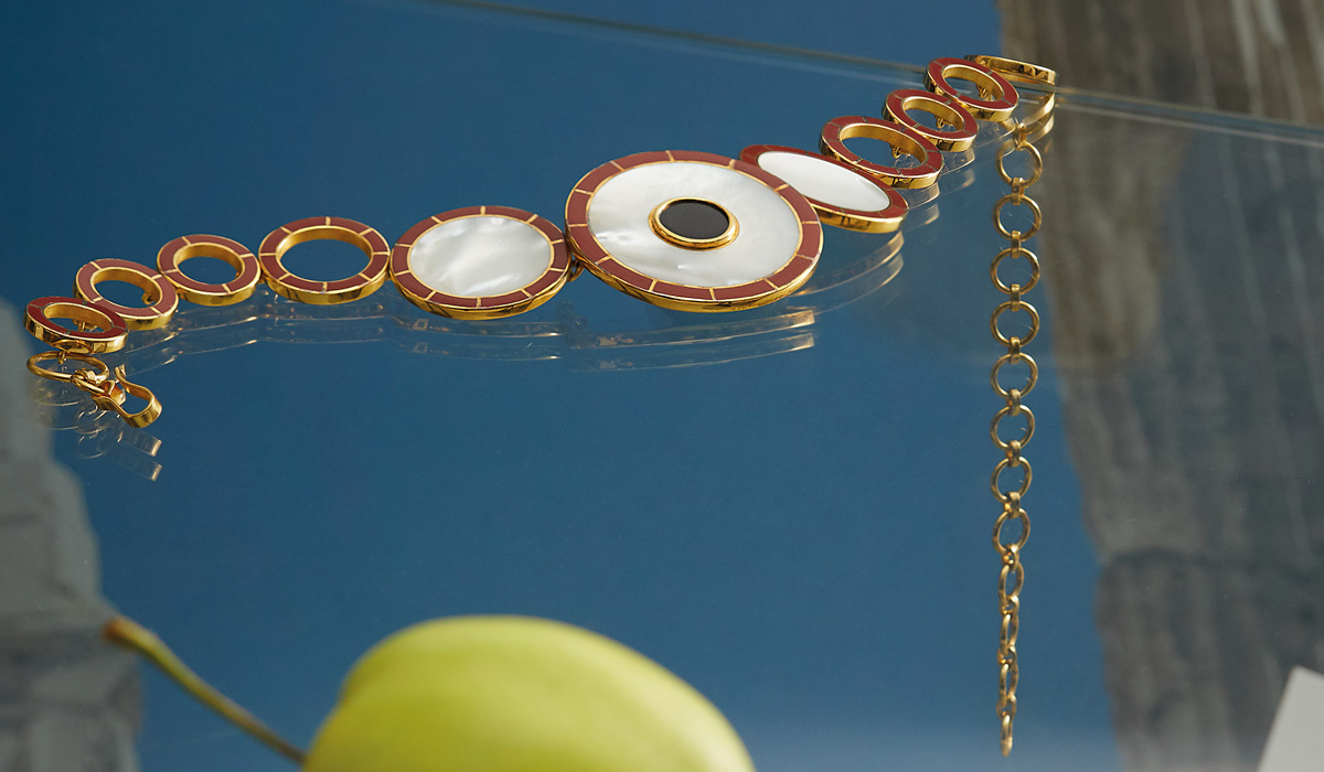 Gold plated brass necklace with mother of pearl, onyx and red jasper, Monica Sordo.