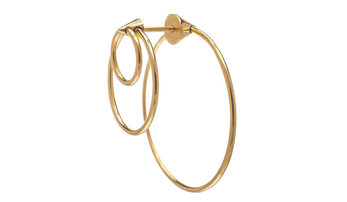 Gold Twins hoop earring. Delfina Delettrez