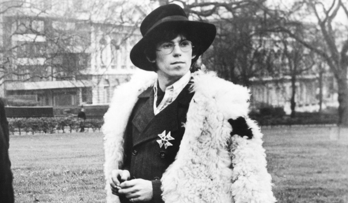 Keith Richard with a malta cross brooch on a sheperd jacket. Photo by Keystone France