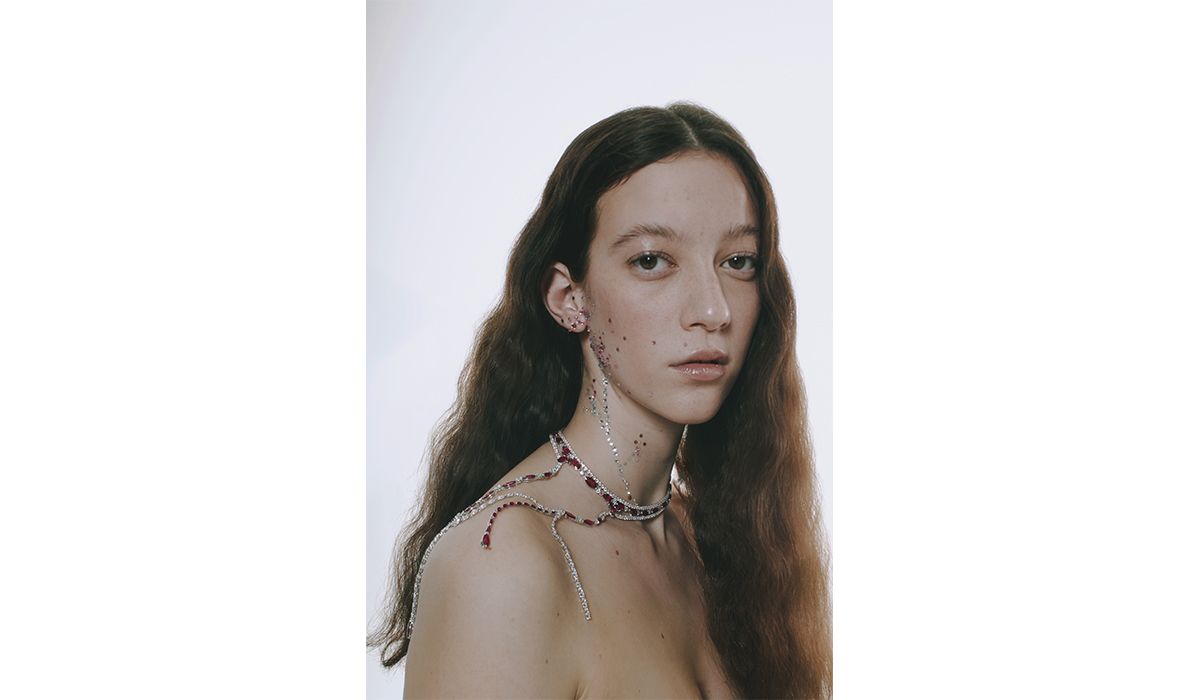 White gold choker with hanging strands of navette-cut diamonds and rubies. Crivelli