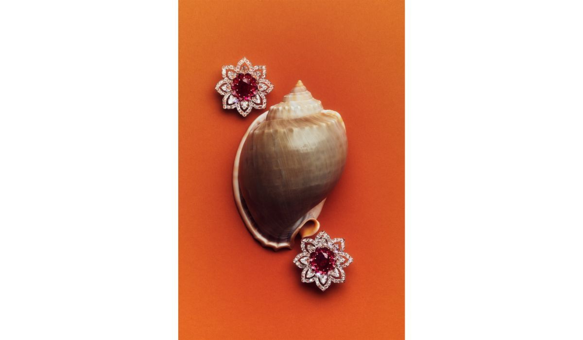 White gold and diamond Eden earrings, set with two central oval-cut Burmese rubies and pear-cut rubies, Busatti Milano