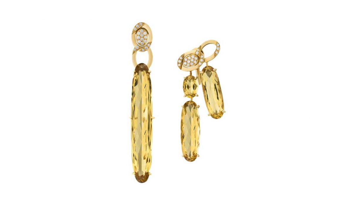 Gold earrings with oval cut, yellow beryls and brilliant cut diamonds.