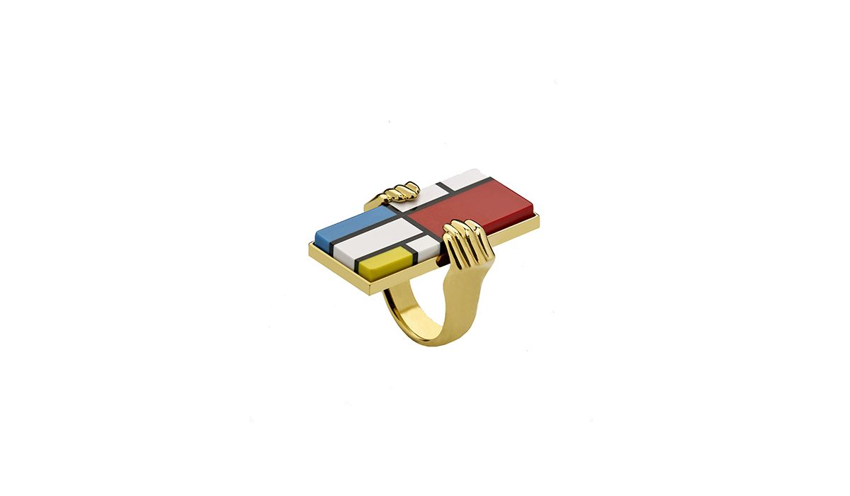 Mondrian ring in yellow gold with hard stones.