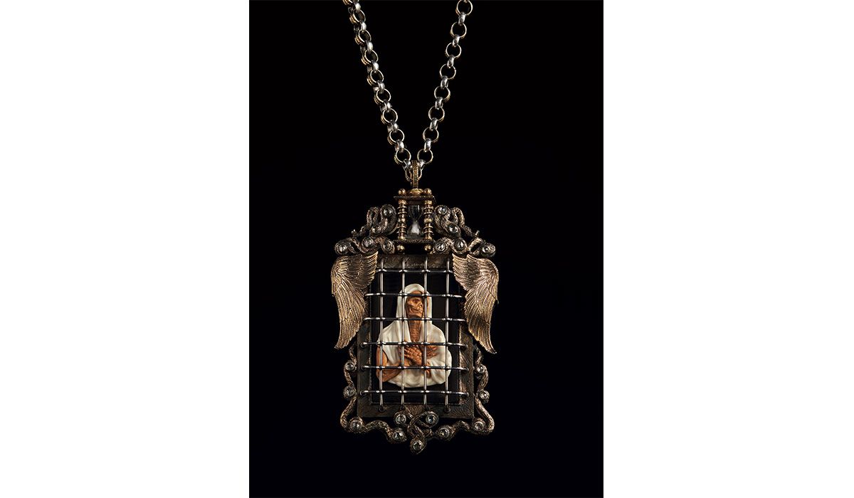 Santa Maria del Popolo pendant necklace in yellow gold and silver set with diamonds, agate, rock cristal and carved bone, circa 1950s.