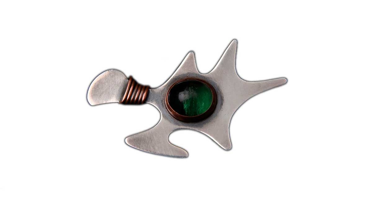 Silver brooch with copper and green glass stone, Ed Wiener, 1950 circa, selected by Chichi Meroni, founder and owner of L’Arabesque in Milan.