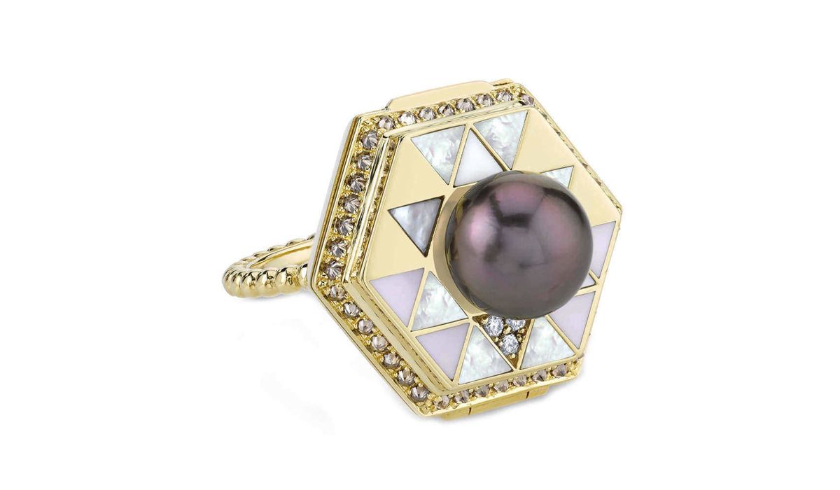 Harrell Godfrey. Yellow gold Poison ring with white diamonds, set with triangular stones composed of mother of pearl, white onyx, pavé diamonds and pale lilac enamel