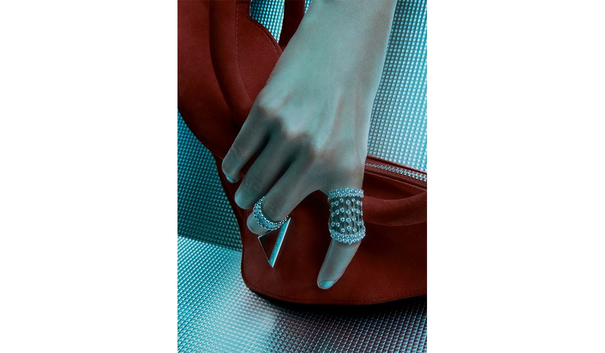 On the right. White gold Alto Sahara pavé ring with diamonds. On the left. White gold BouBoulette pavé ring with diamonds. Casato. Rocket Girl bag. Monte Sharp