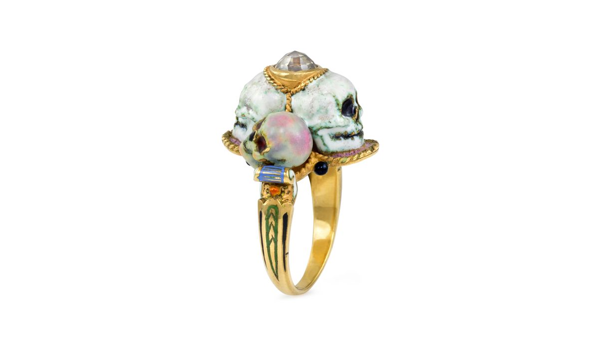  A diamond, enamel, and 18 karat gold skull ring by Codognato, 1980s.