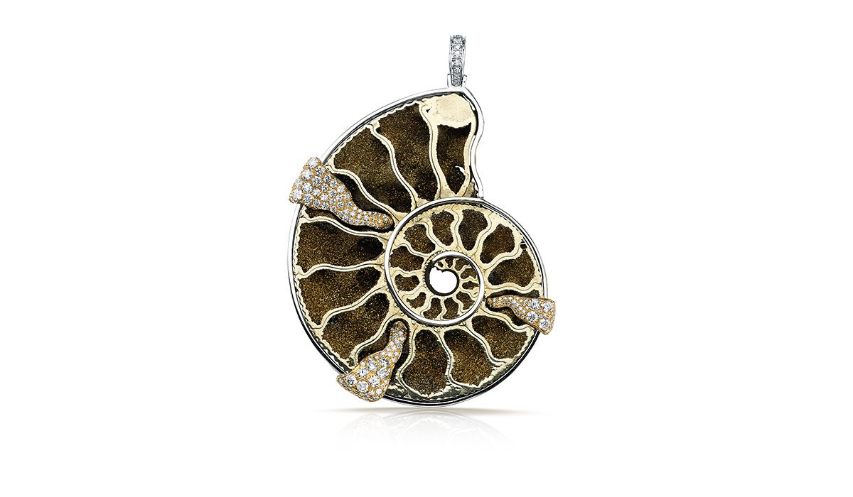 gold pendant with a 111.71ct ammonite fossil in pyrite with an outline of pavé diamonds