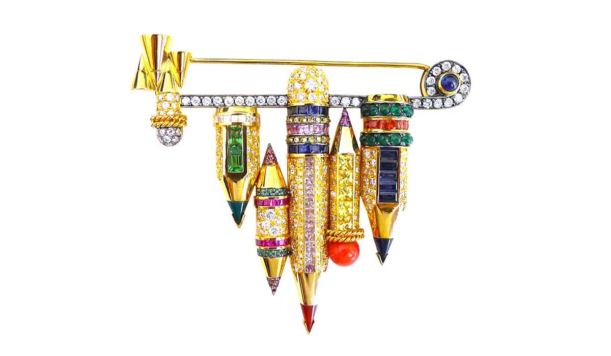 Pencil brooch with multi-colored diamonds and sapphires, emeralds and tsavorites.