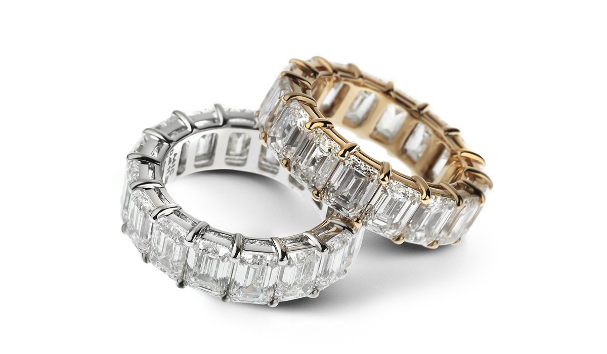 White and rose gold rings with emerald cut diamonds, OPERA Collection