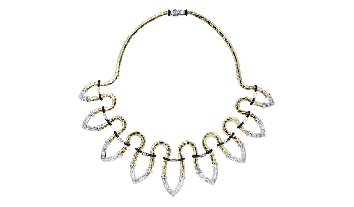 Yellow and white gold necklace with diamonds by Nikos Koulis.